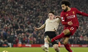 Mohamed Salah saat mencetak gol ke gawang MU. (internet)